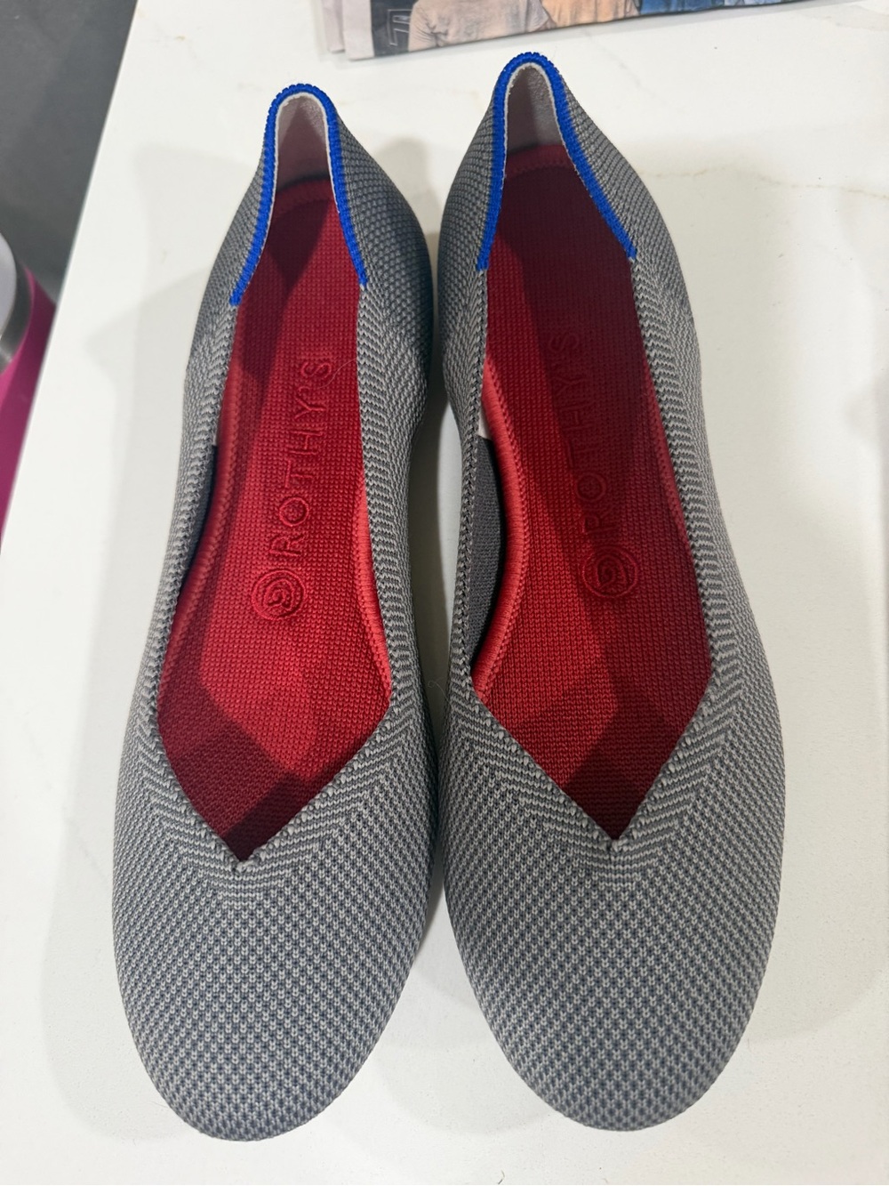 Rothy's Gray Slip-On Flats with Red Insole and Blue Trim